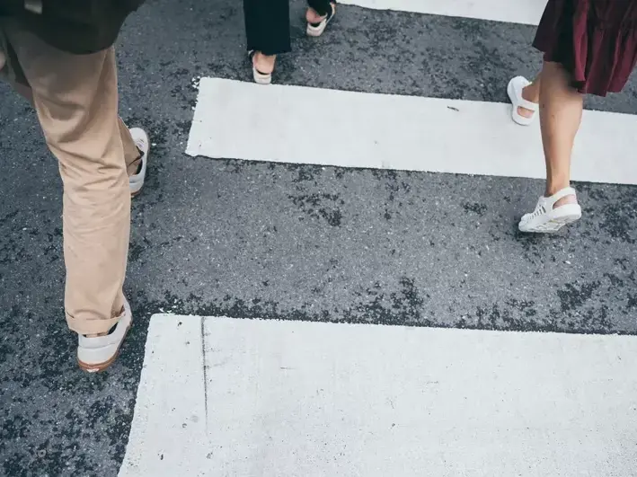 Arizona injury attorney reviewing fatal pedestrian accident evidence from a roadway near San Tan Village Shopping Center
